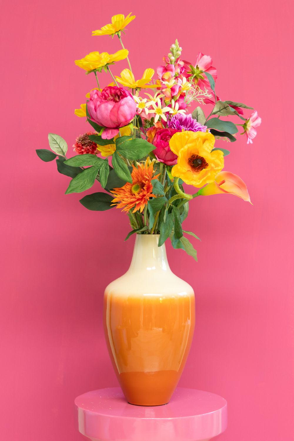 Bouquet Artificiel Sunset Symphony sur fond rose